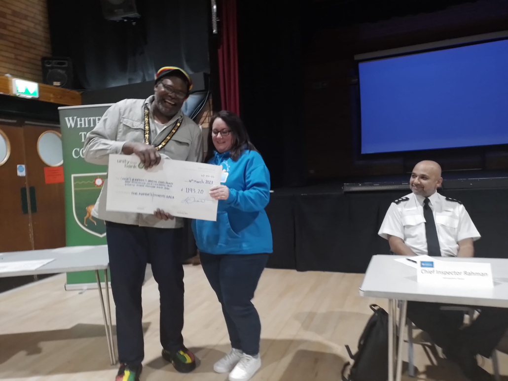 Mayor and woman with cheque