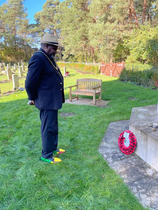 Mayor with wreath on war memorial